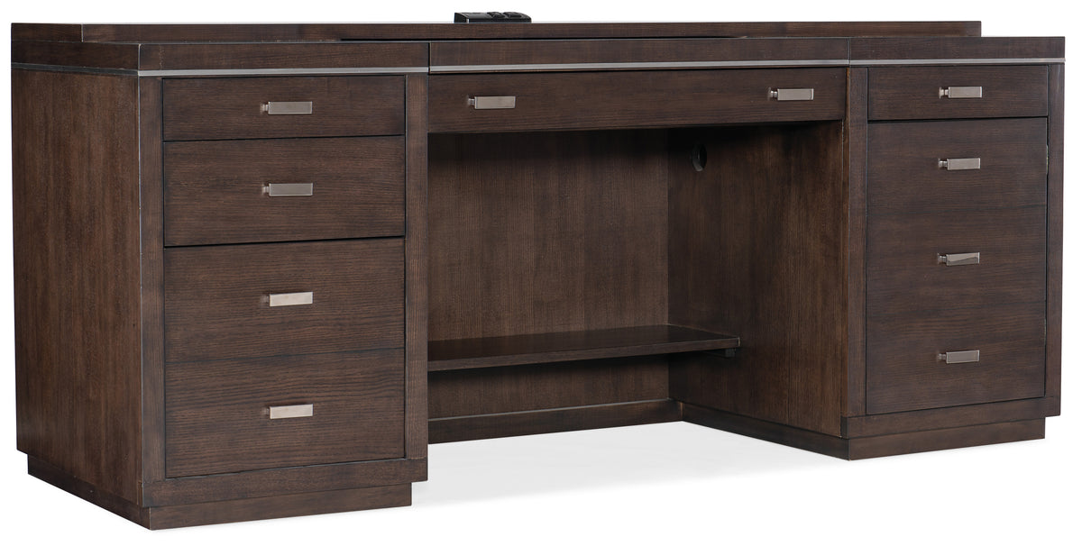 a desk with drawers and a remote control
