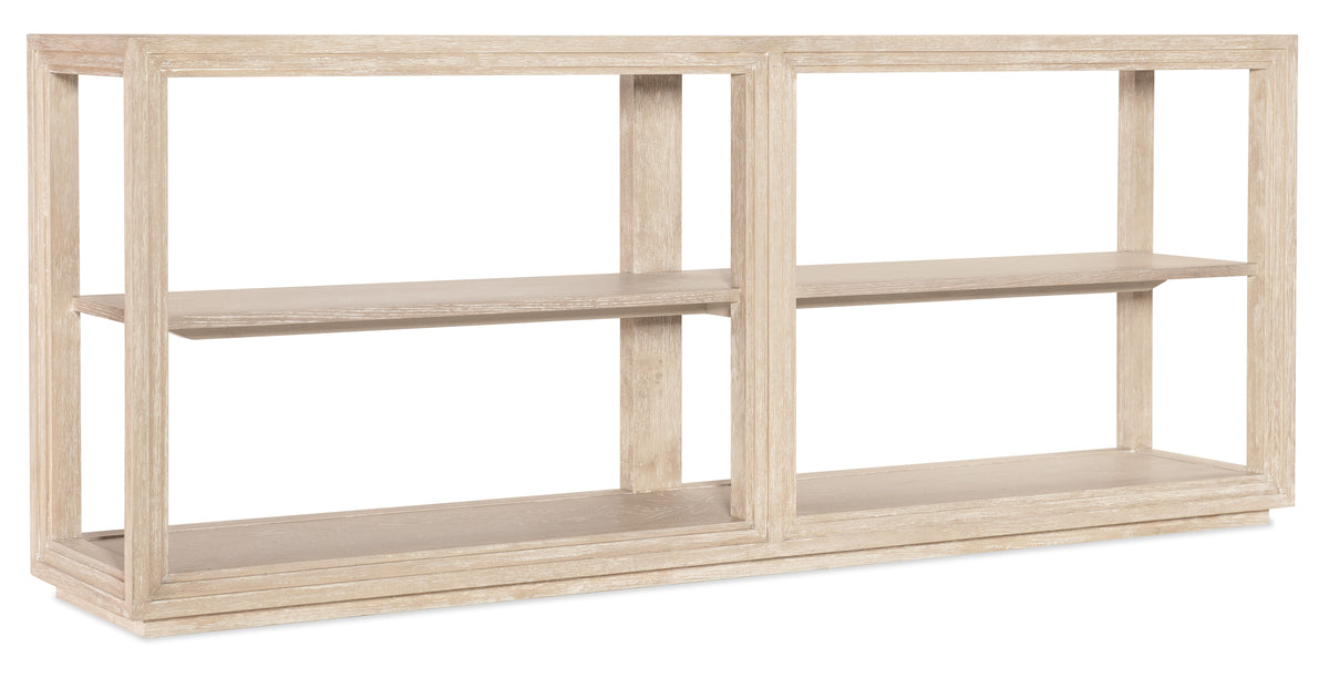 a white shelf with four shelves