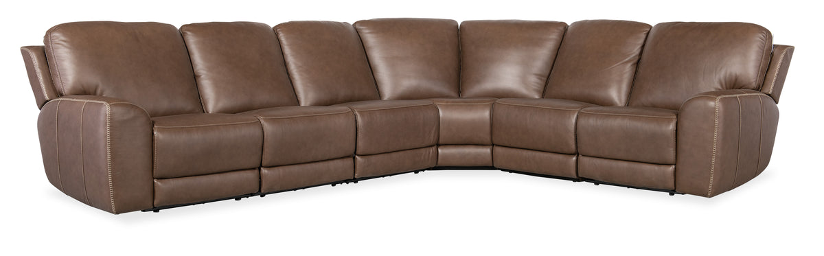 a brown leather couch with a white background