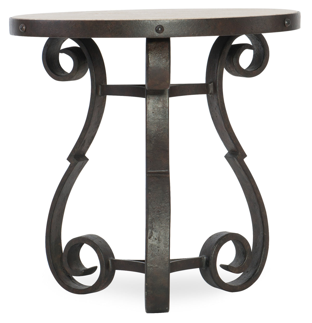a round metal table with swirls