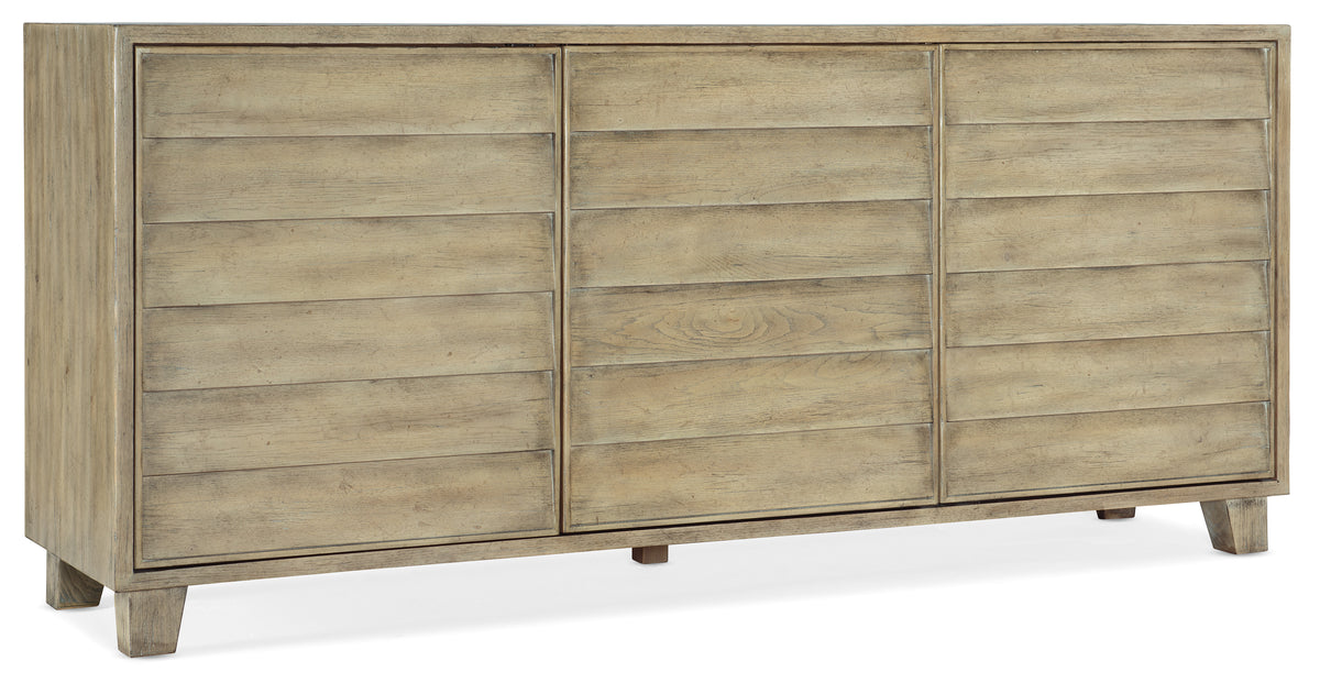 a wooden cabinet with four doors