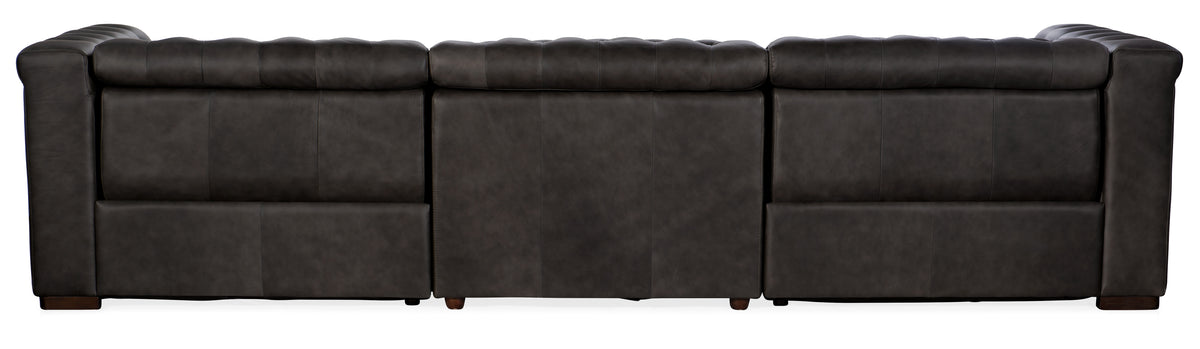 the back of a black leather couch