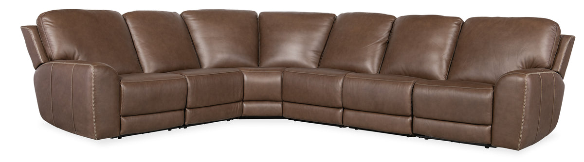 a brown leather couch with a white background