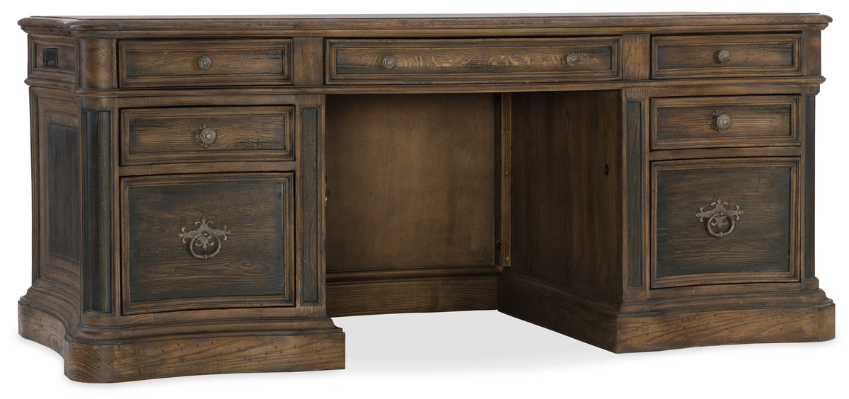 a wooden desk with drawers