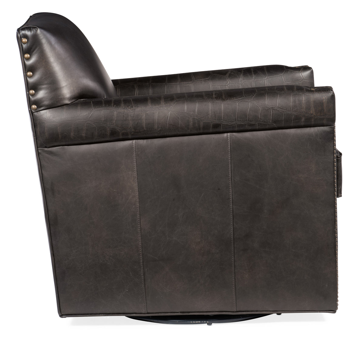 a black leather chair with a pillow