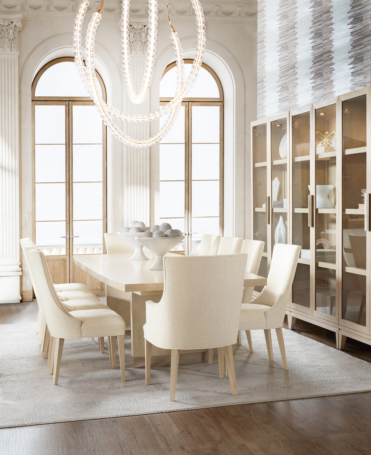 a dining room with a table and chairs