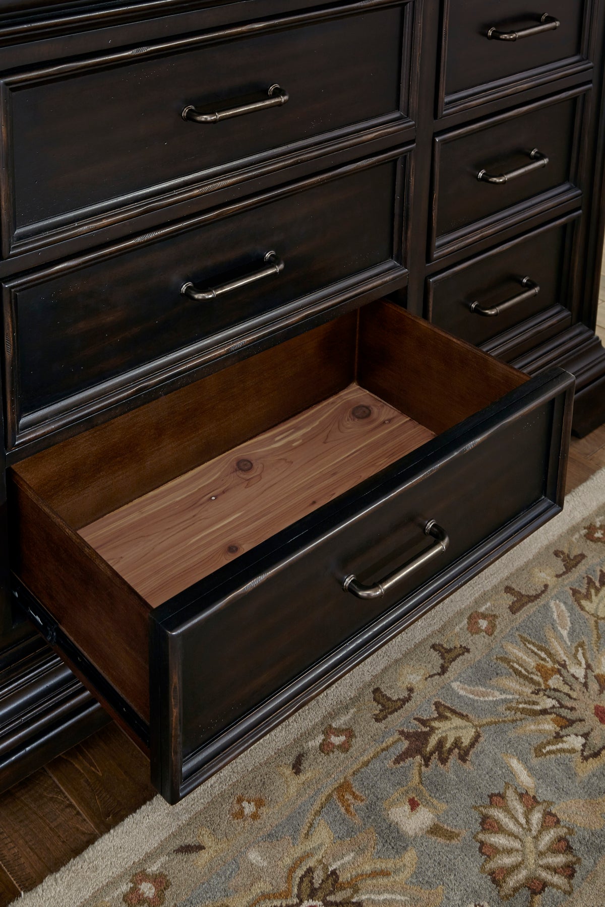 a drawer with a wood surface