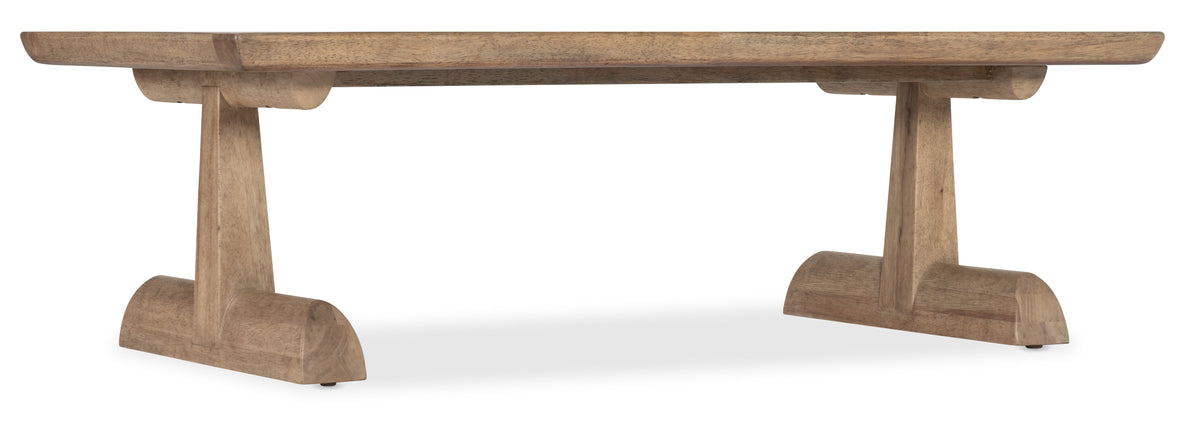 a wooden table with a metal leg