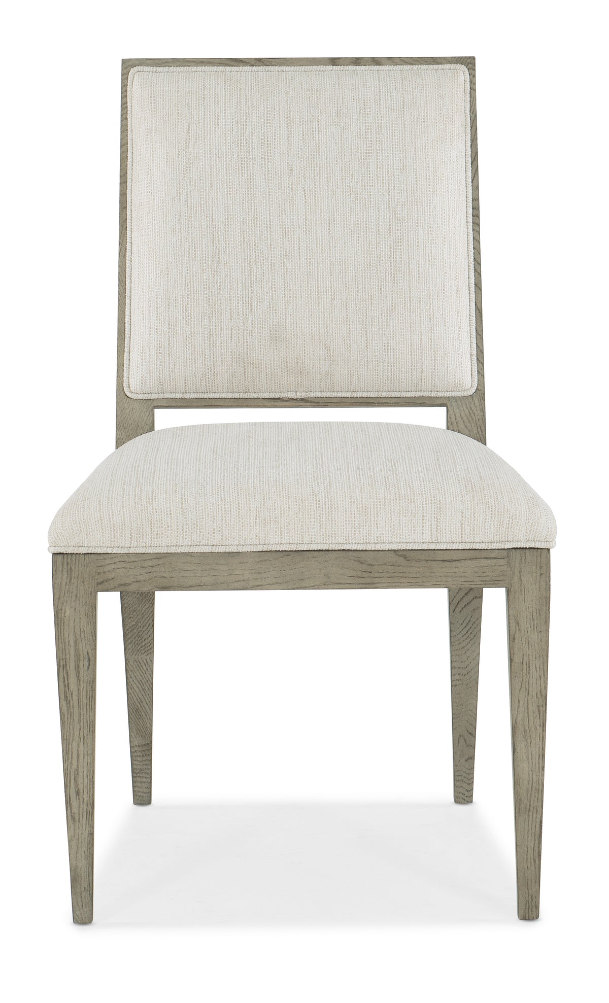 a white chair with a white cushion
