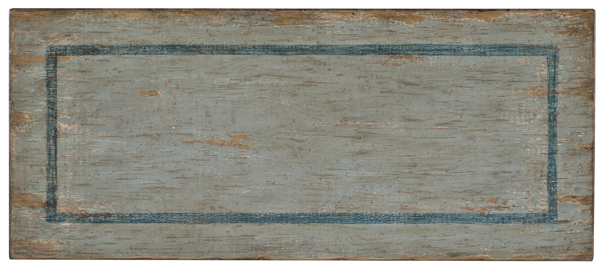 a wood sign with blue lines