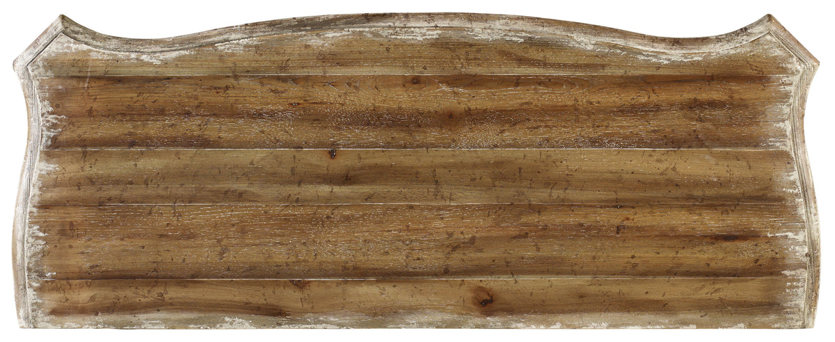 a wooden board with white paint