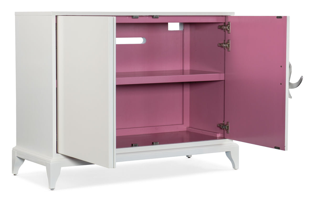 a white and pink cabinet