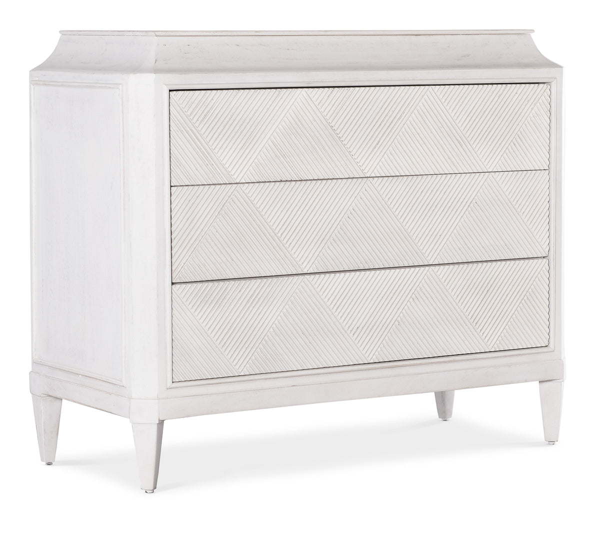a white dresser with three drawers