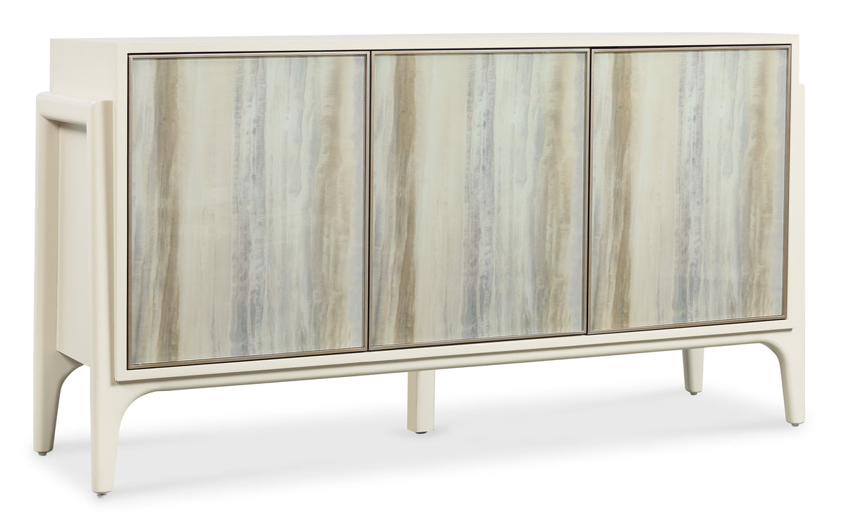 a white cabinet with three doors