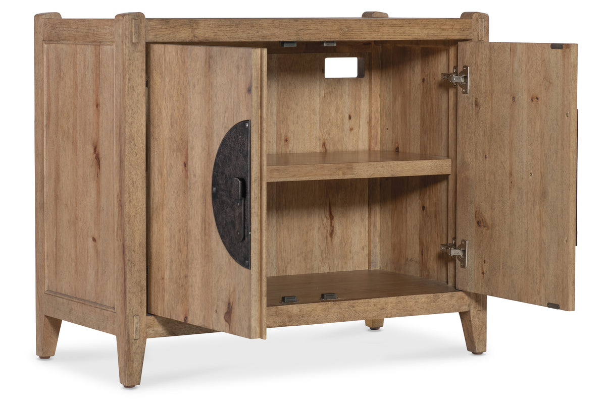 a wooden cabinet with a door open