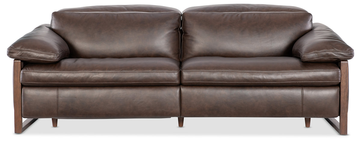 a brown leather couch with two seats