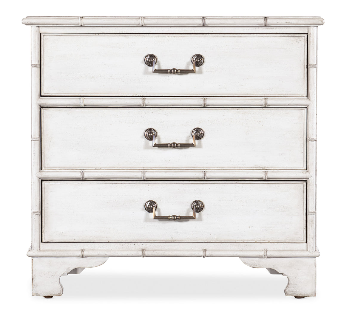 a white dresser with handles