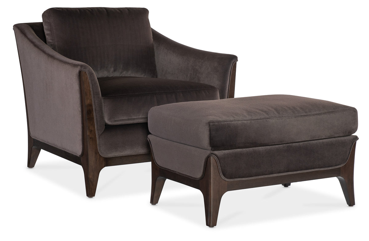a chair and ottoman with a white background
