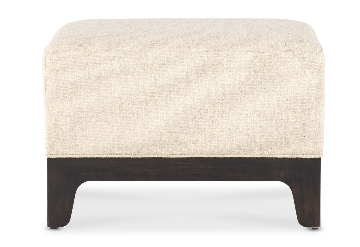a white and brown ottoman