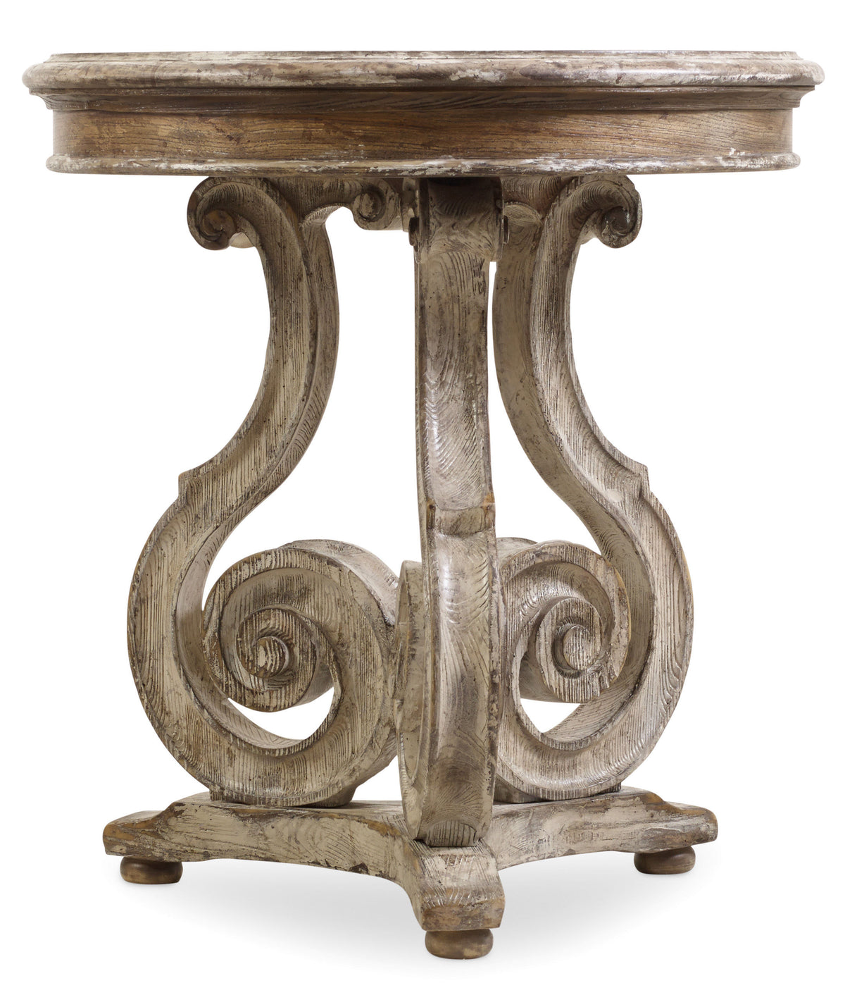 a round wooden table with a white surface