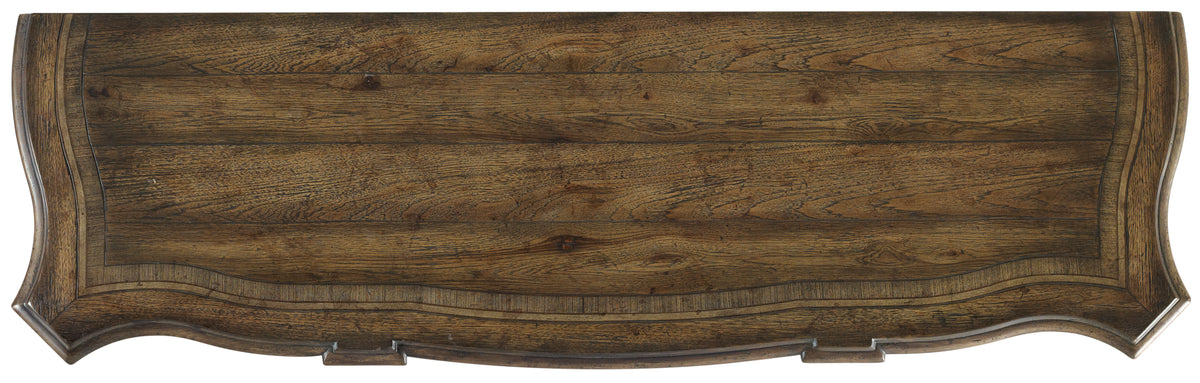 a wooden table with a curved top