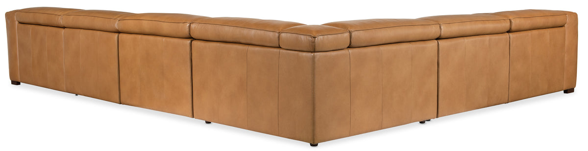 a brown leather corner chair