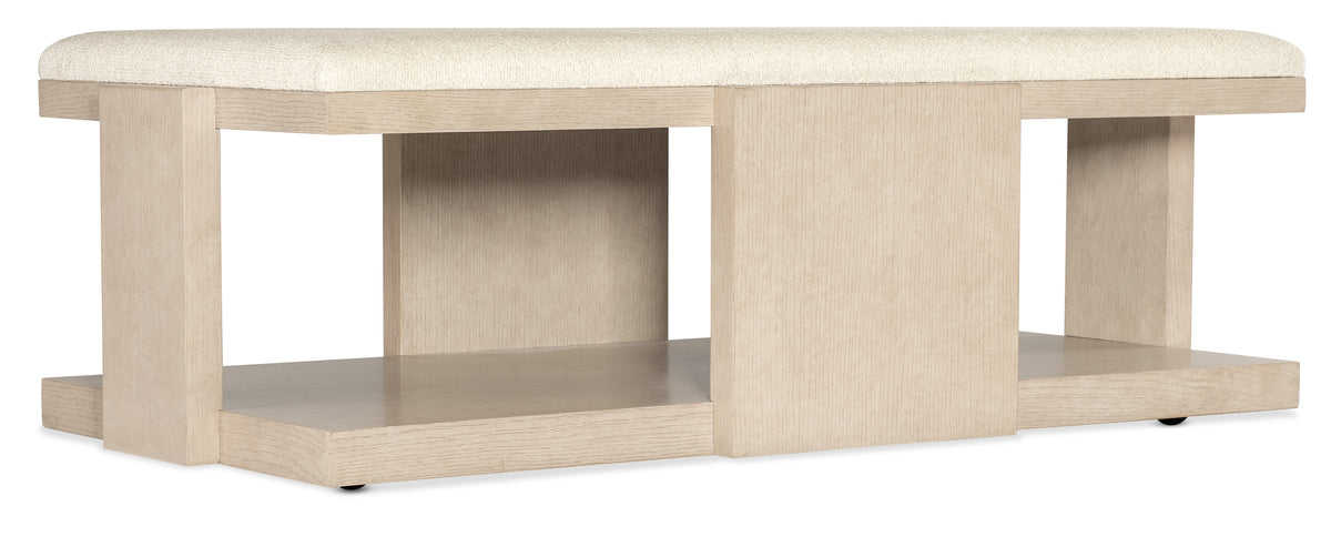 a white shelf with a cushion