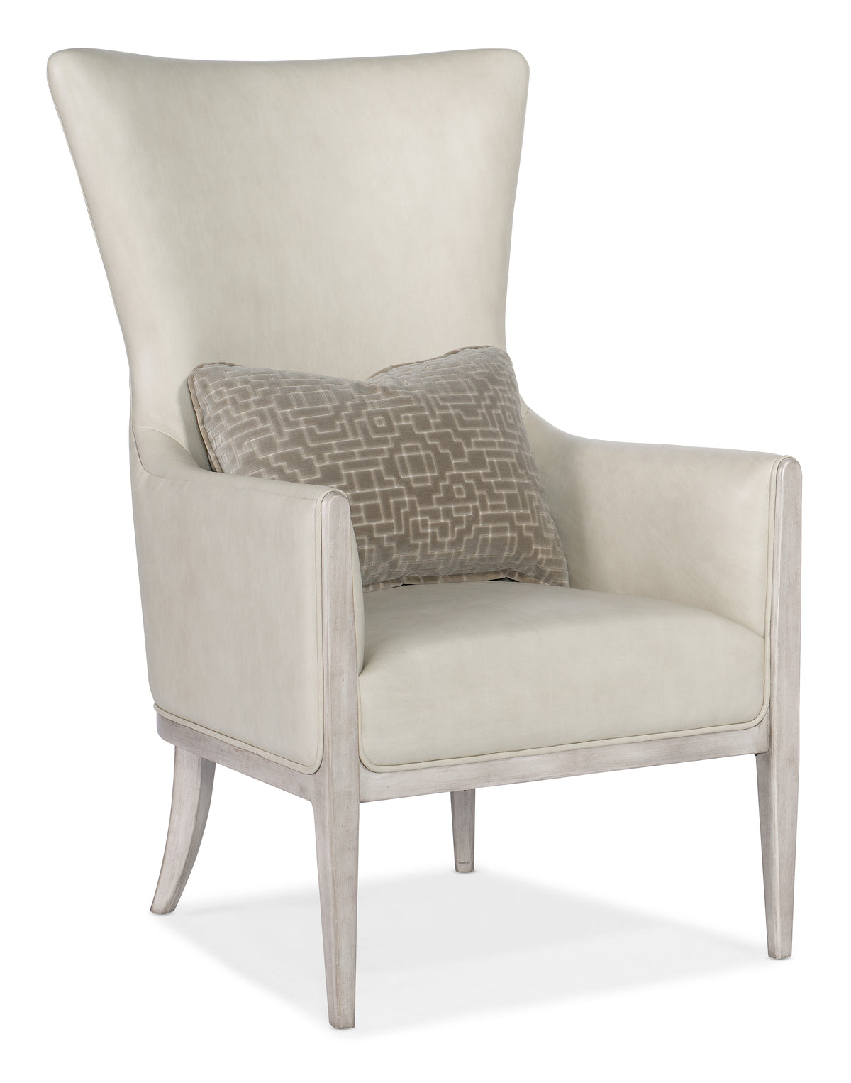 a white chair with a pillow