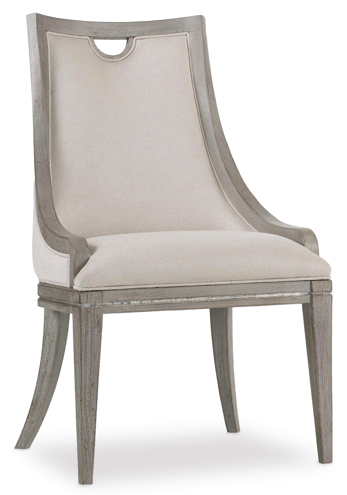 a white chair with a wooden frame