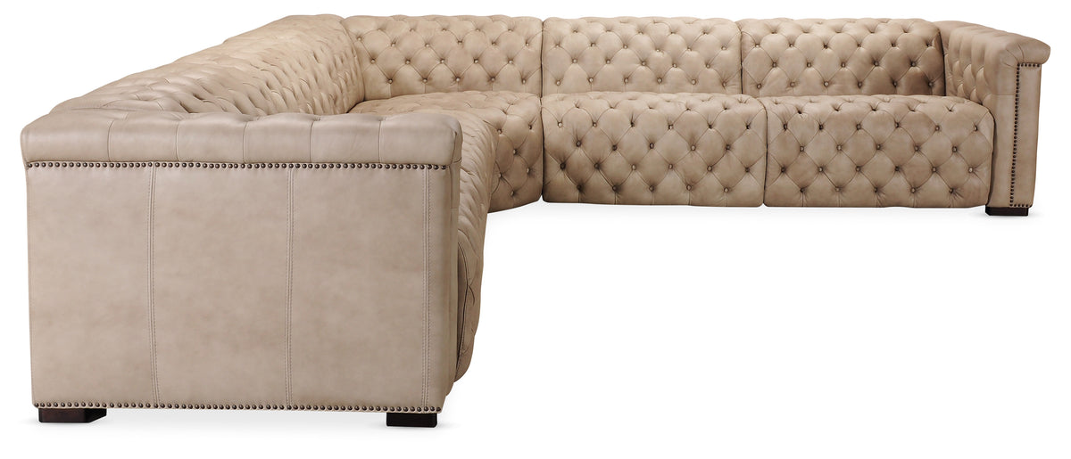 a tan leather couch with a white background
