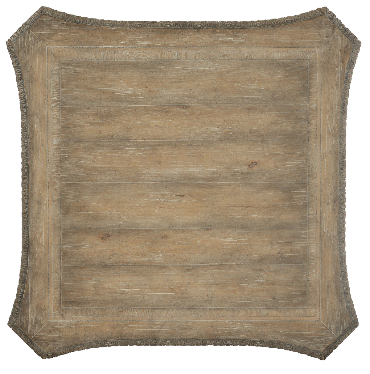 a wood square with a scalloped edge