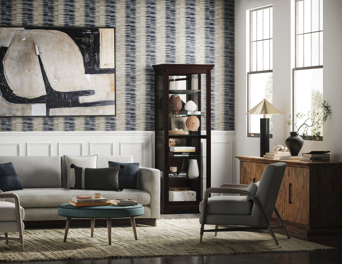 a living room with a couch and a cabinet