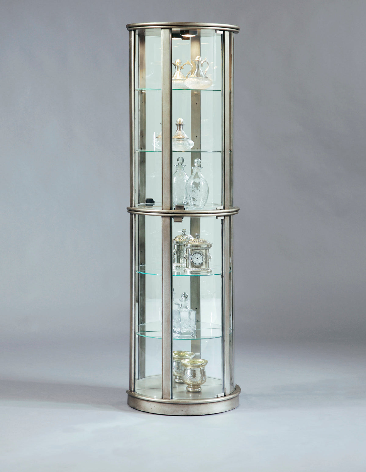 a glass cabinet with glass shelves