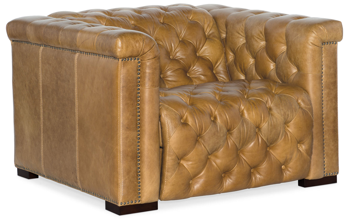 a brown leather chair with buttons