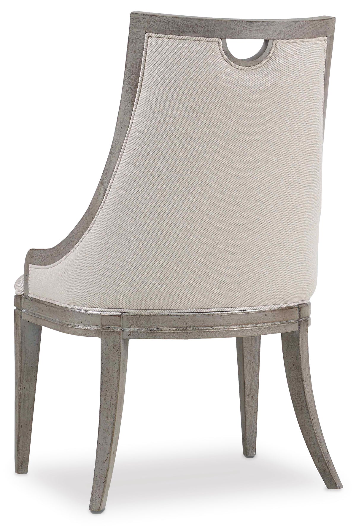 a white chair with wooden legs