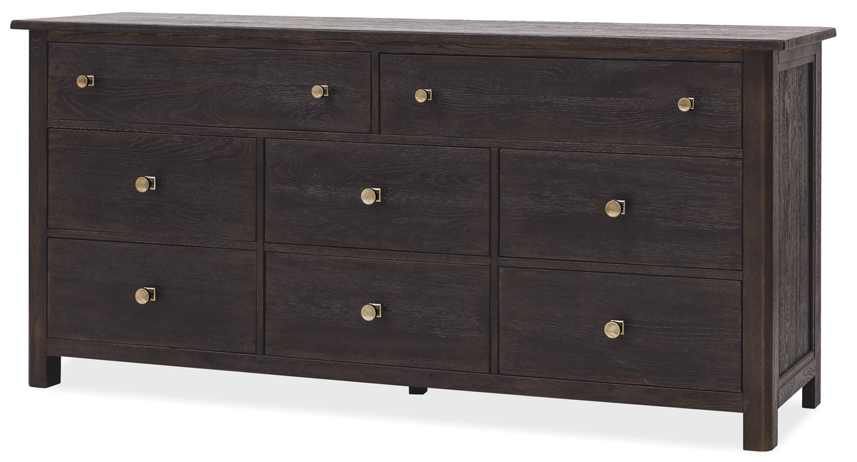 a black dresser with gold knobs