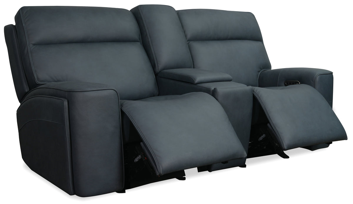 a grey couch with armrests
