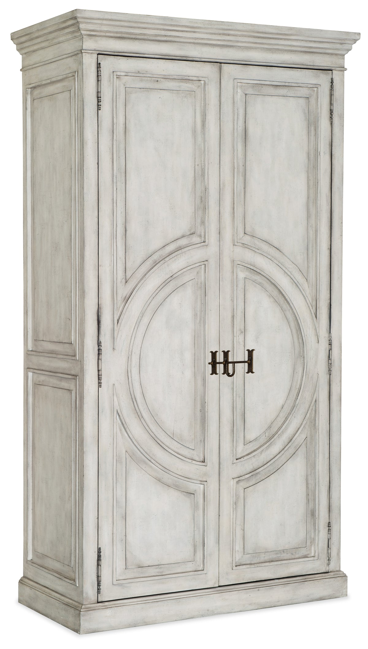 a white cabinet with a gold letter on it