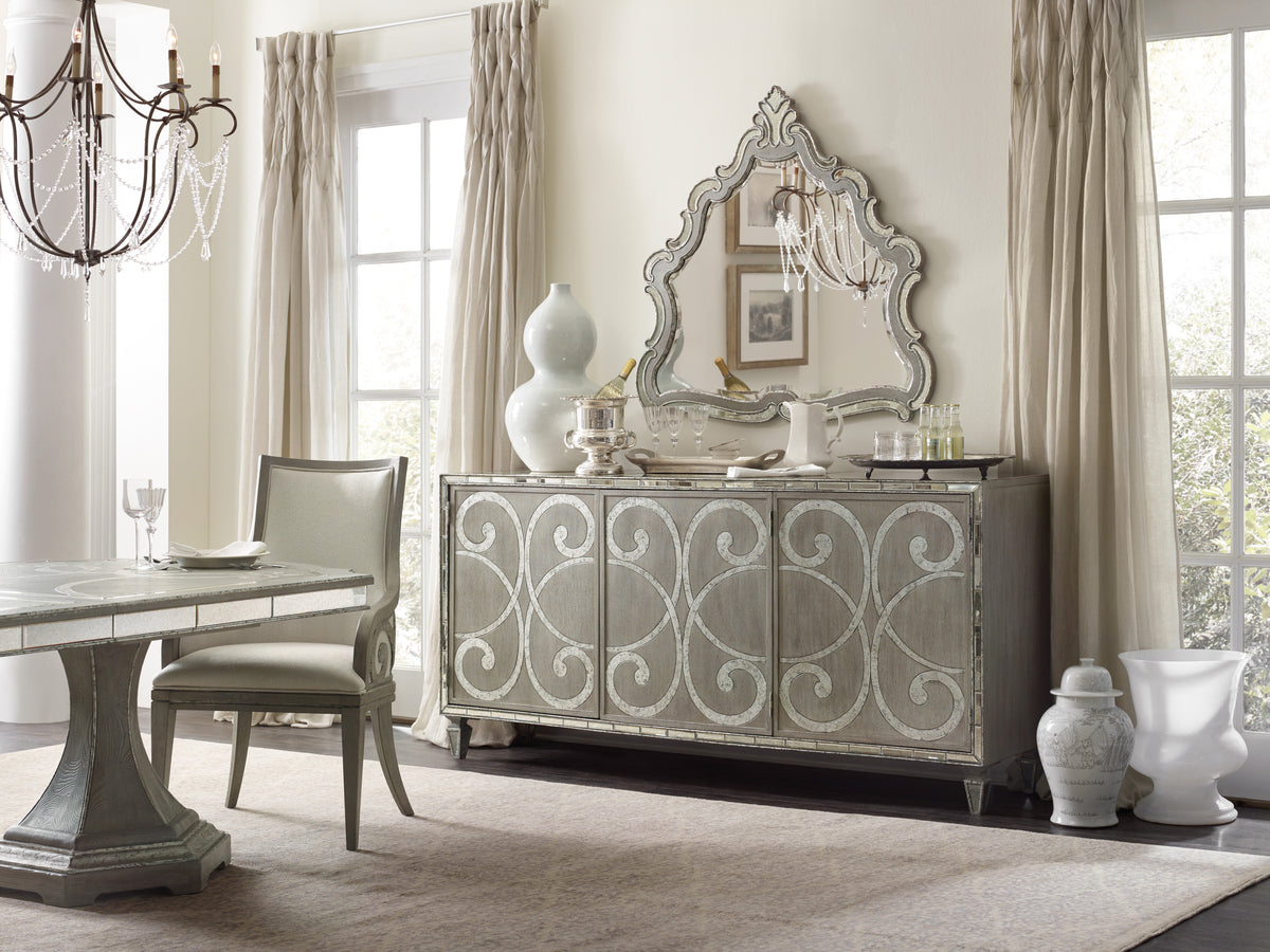 a room with a mirror and a table