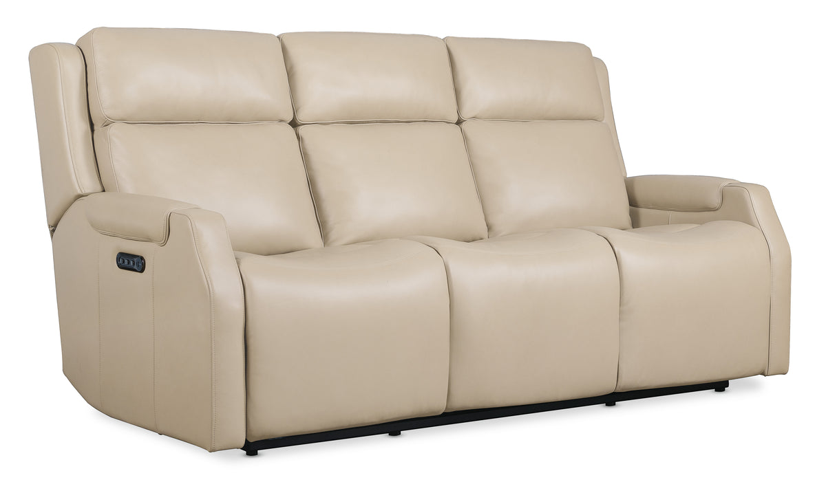 a white couch with black legs