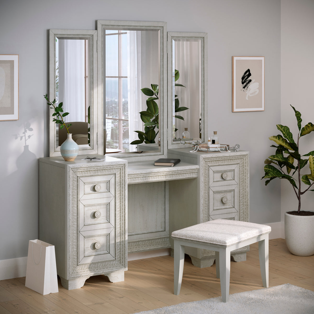 a white vanity with a bench and a plant in a pot
