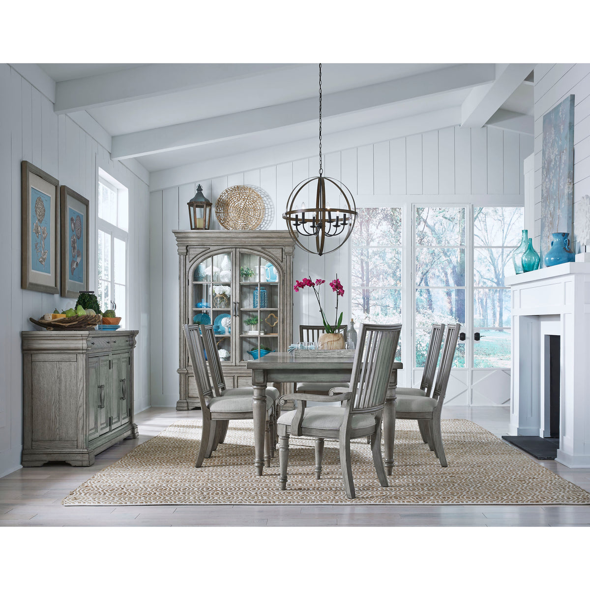 a dining room with a table and chairs