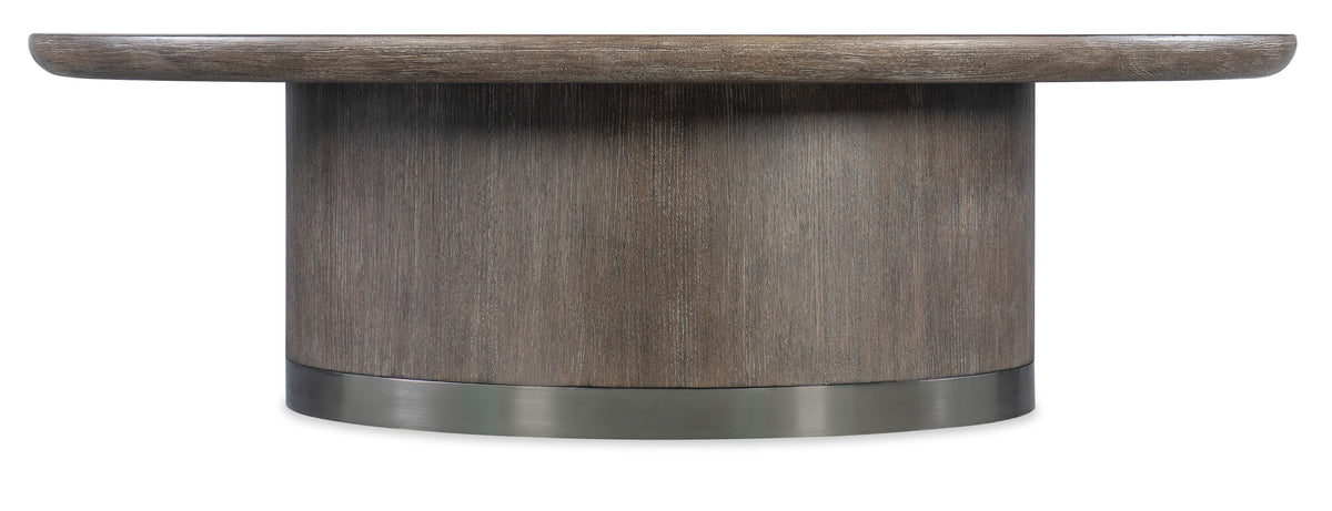 a round wooden table with a metal base