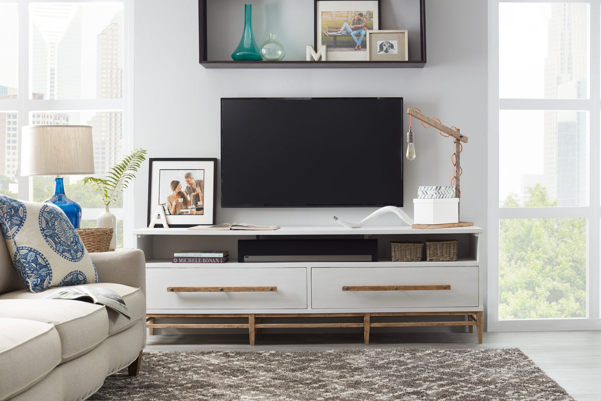 a tv on a shelf in a living room