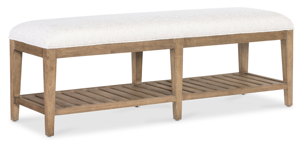 a bench with a white cushion