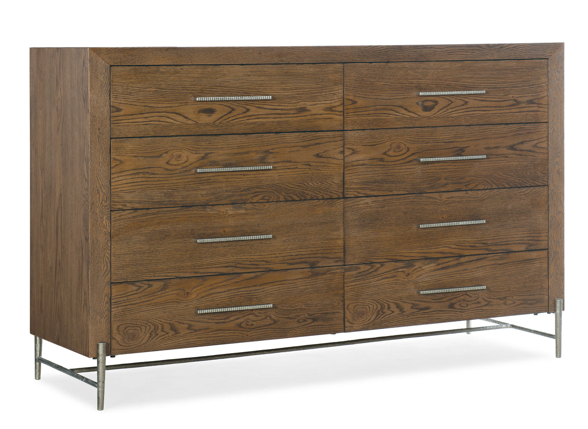 a brown dresser with silver handles