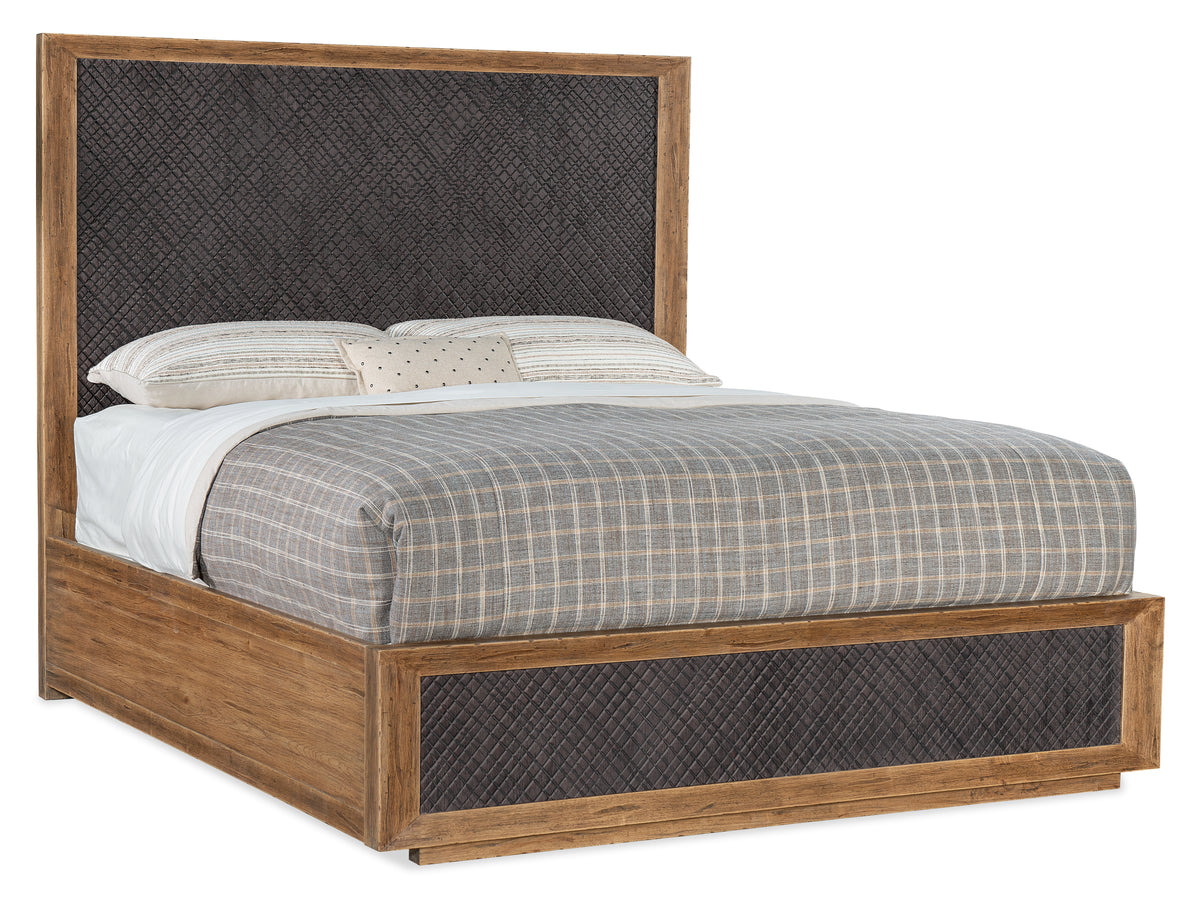 a bed with a wooden frame