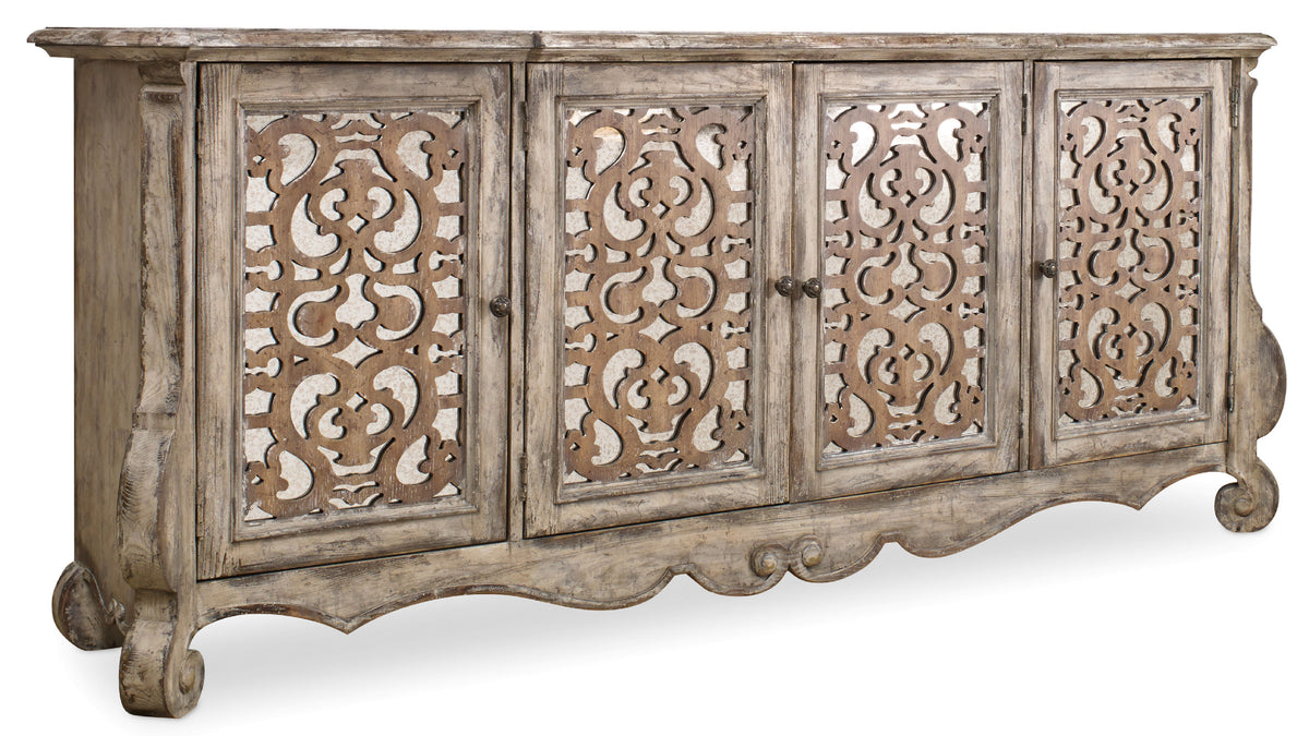 a wooden cabinet with a carved design