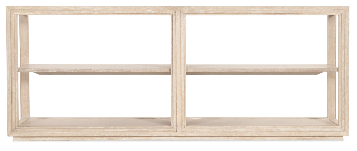 a white shelf with three shelves