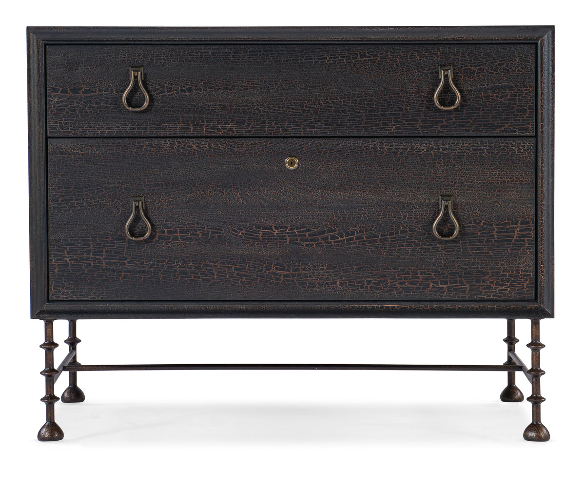 a black dresser with metal handles